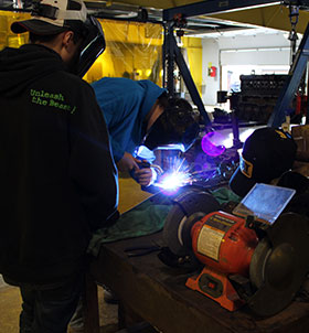 Students welding